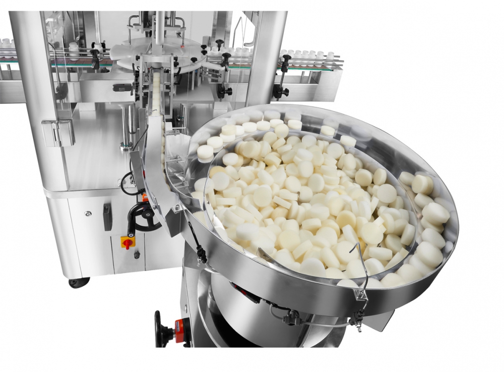 Automatic unscrambling vibrators for plastic foam.